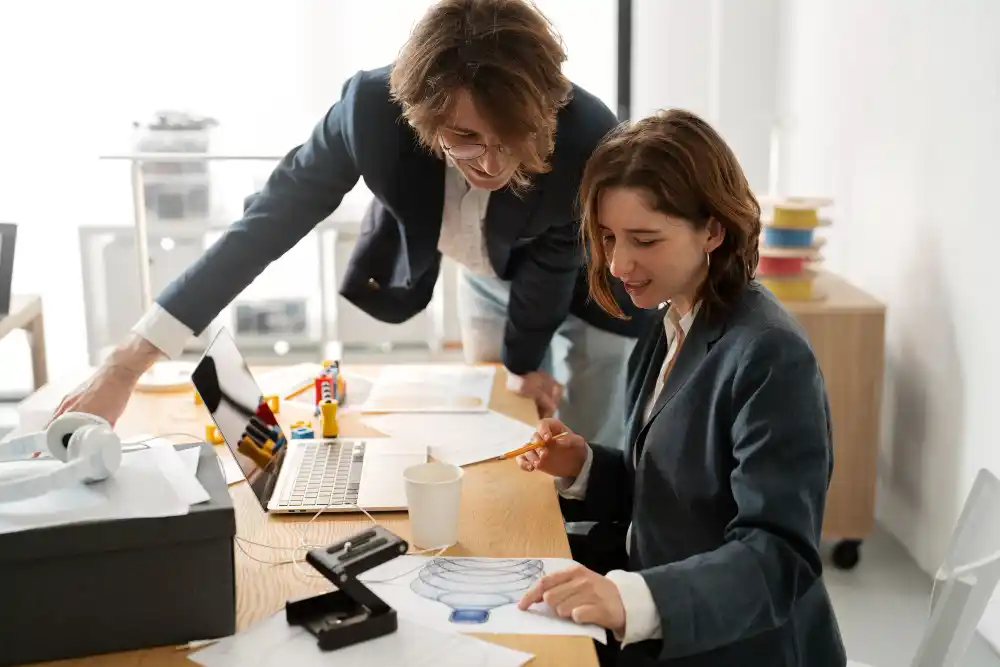 Small Business Grants image of Checking reports in office