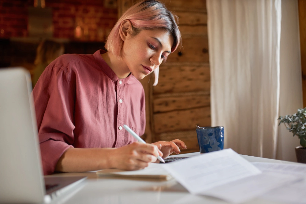 Grant Writer image of writing women