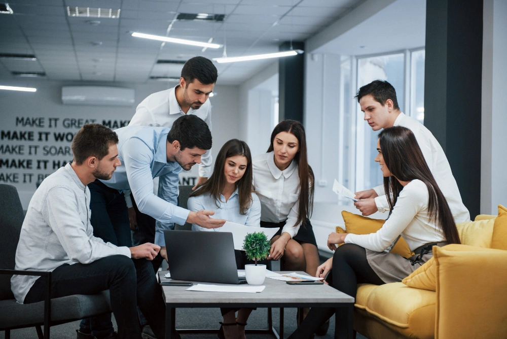 Grant Writer office image of working employees