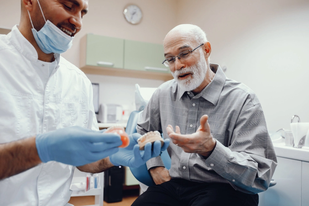 Grants for Dental Implants image of in California old man as a pateint